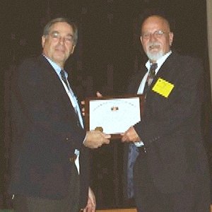 Fred Scheer receives the MBAA Sub Charter from President Larry Sidor